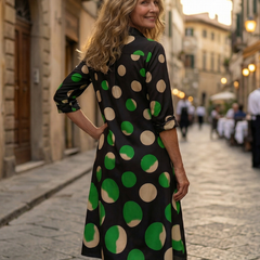 Black Kaia Dinner Walk Dress by THE WHITMORE FAMILY, featuring a stylish, elegant design with a fitted silhouette and flowy skirt.