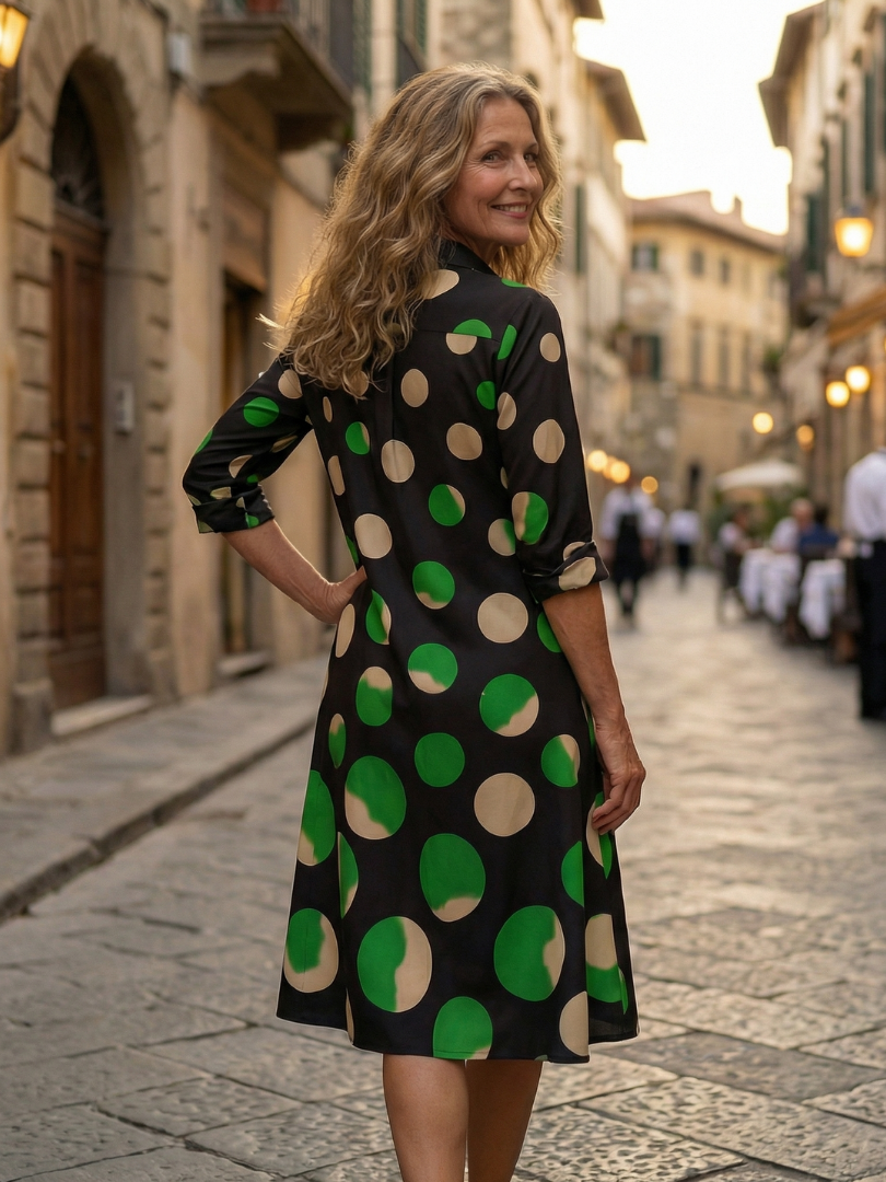 Black Kaia Dinner Walk Dress by THE WHITMORE FAMILY, featuring a stylish, elegant design with a fitted silhouette and flowy skirt.