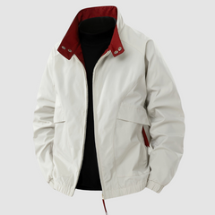Black Mason™ casual spring jacket by THE WHITMORE FAMILY, shown on a hanger with a lightweight, stylish design.