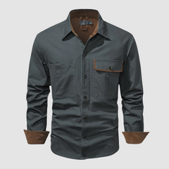 Black Mathew™ elegant long-sleeved shirt by THE WHITMORE FAMILY, displayed flat showing front details and collar.