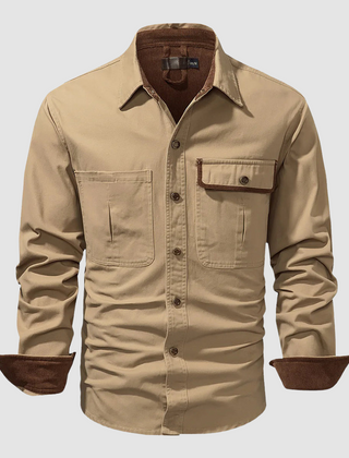 Black Mathew™ elegant long-sleeved shirt by THE WHITMORE FAMILY, shown on a mannequin with a classic collar and tailored fit.