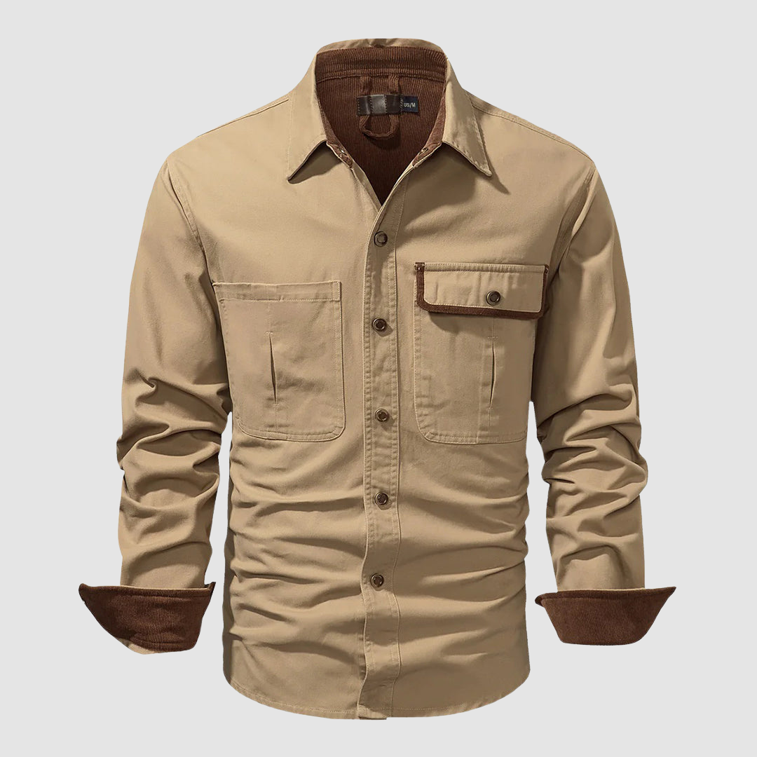 Black Mathew™ elegant long-sleeved shirt by THE WHITMORE FAMILY, shown on a mannequin with a classic collar and tailored fit.