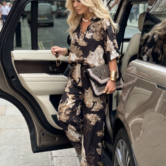Black Mina printed wide-leg wrap top set by THE WHITMORE FAMILY, featuring a stylish top with matching wide-leg pants.