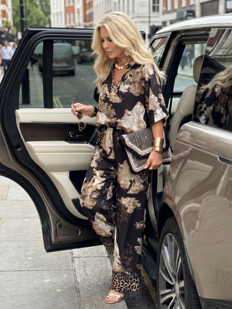 Black Mina printed wide-leg wrap top set by THE WHITMORE FAMILY, featuring a stylish top with matching wide-leg pants.