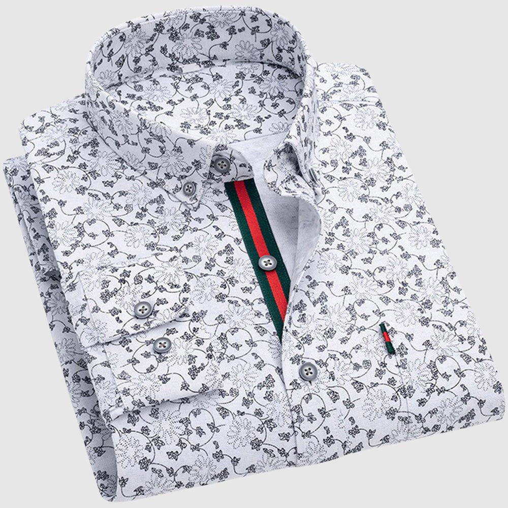 Valentino™ Floral Essence Shirt by THE WHITMORE FAMILY featuring a vibrant floral print and classic collar, displayed on a hanger.
