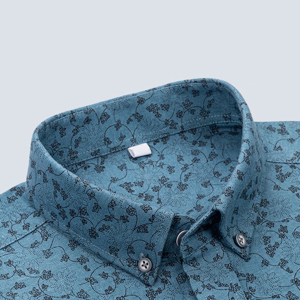 Valentino™ Floral Essence Shirt by THE WHITMORE FAMILY featuring a vibrant floral pattern, lightweight fabric, and classic collar design.