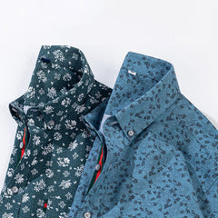 Valentino™ Floral Essence Shirt by THE WHITMORE FAMILY featuring a vibrant floral pattern and classic collar design.