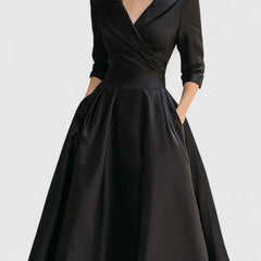 Black Zyrah™ Elegant Midi Dress by THE WHITMORE FAMILY, showcasing a fitted silhouette and stylish design.