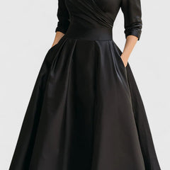 Black Zyrah™ Elegant Midi Dress by THE WHITMORE FAMILY, featuring a fitted silhouette and stylish design for formal occasions.
