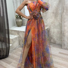 Helen colorful floral dress by THE WHITMORE FAMILY, purple bloemenjurk with elegant, vibrant floral patterns.