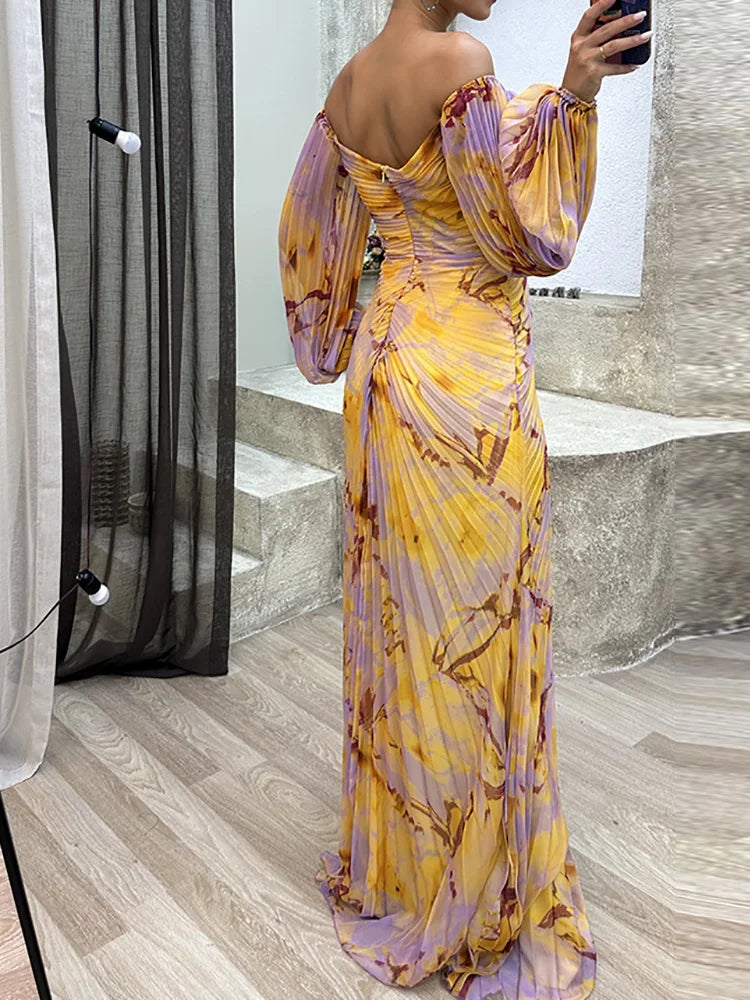 Willow elegant V-neck floral dress by THE WHITMORE FAMILY, featuring a stylish design and flowing fabric.