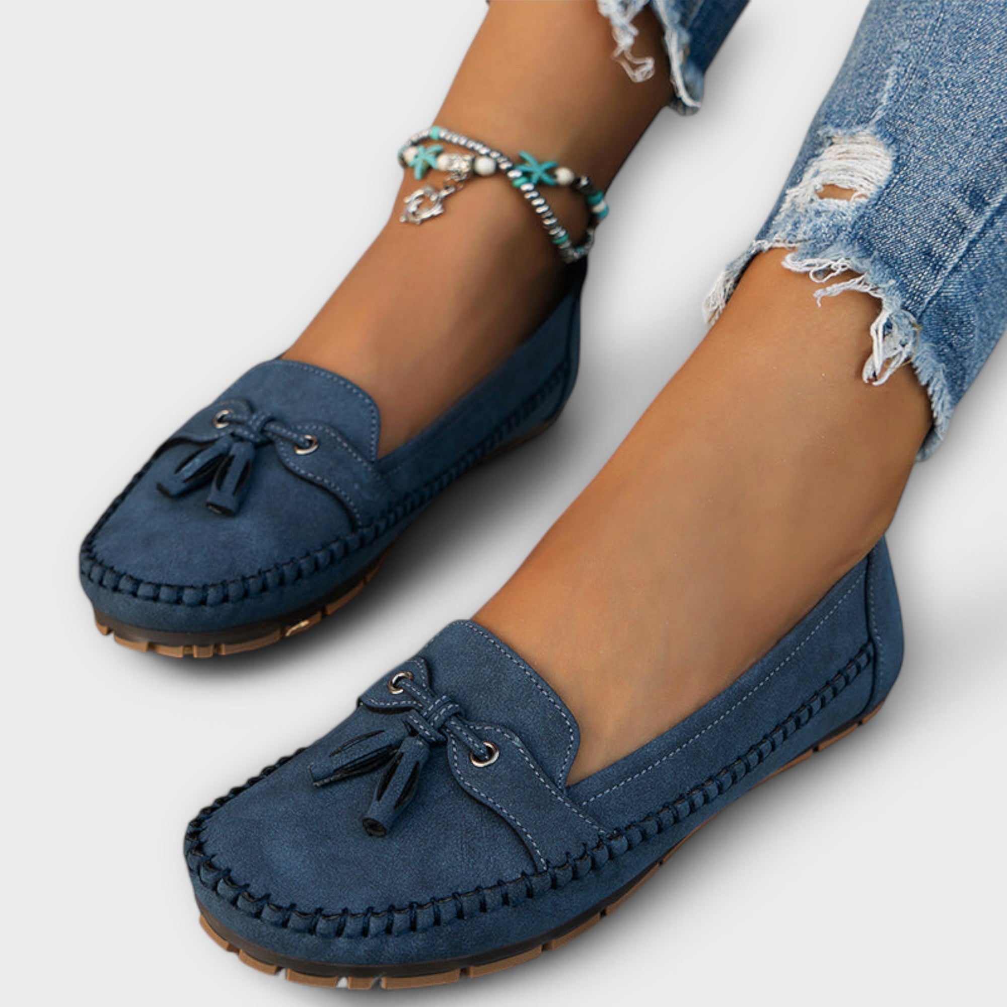 Blue Lisa stylish loafers by THE WHITMORE FAMILY, featuring a sleek design and comfortable slip-on style for women.