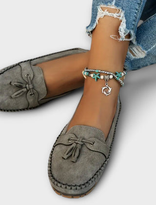 Blue Lisa stylish loafers from THE WHITMORE FAMILY, featuring a sleek design and comfortable slip-on style.