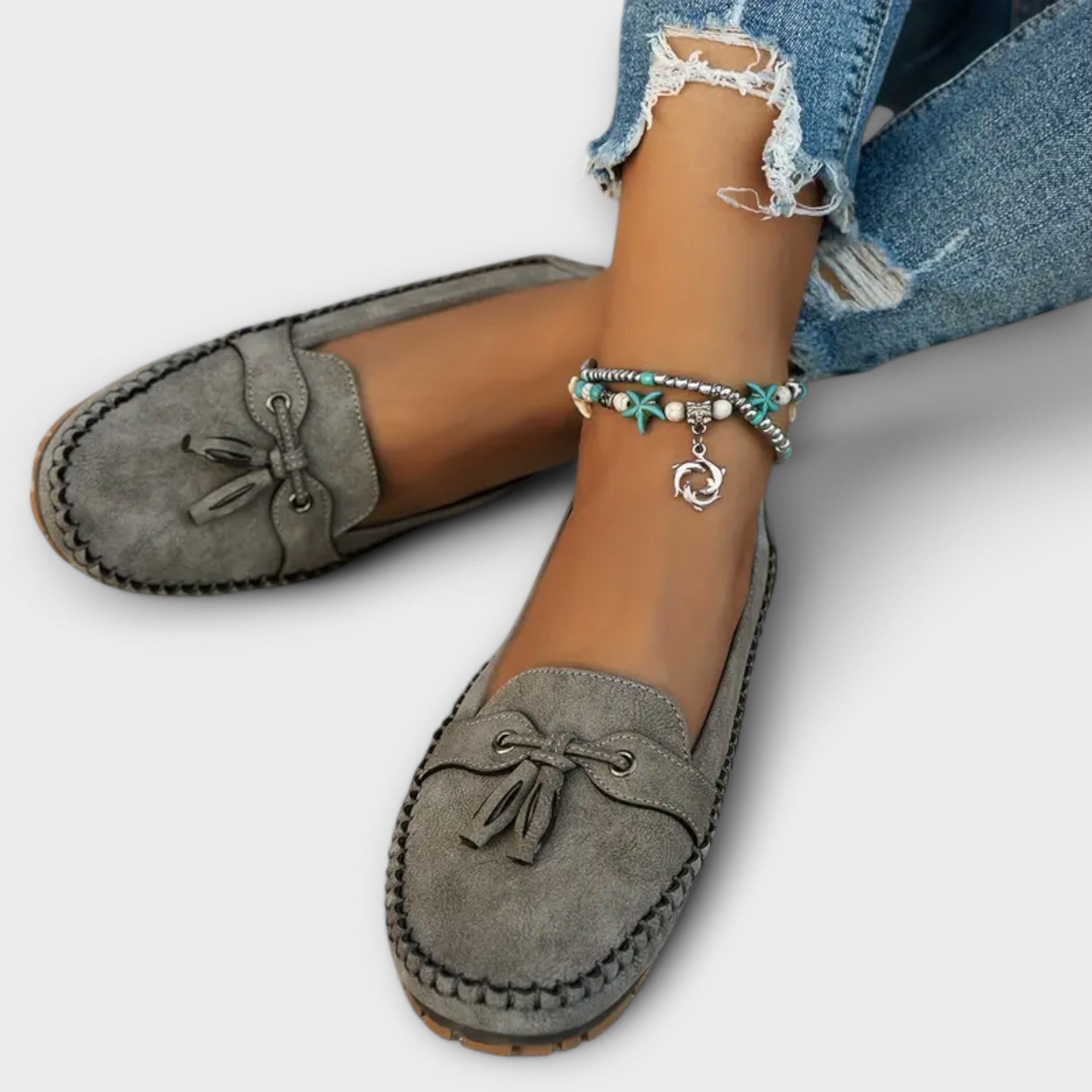 Blue Lisa stylish loafers from THE WHITMORE FAMILY, featuring a sleek design and comfortable slip-on style.