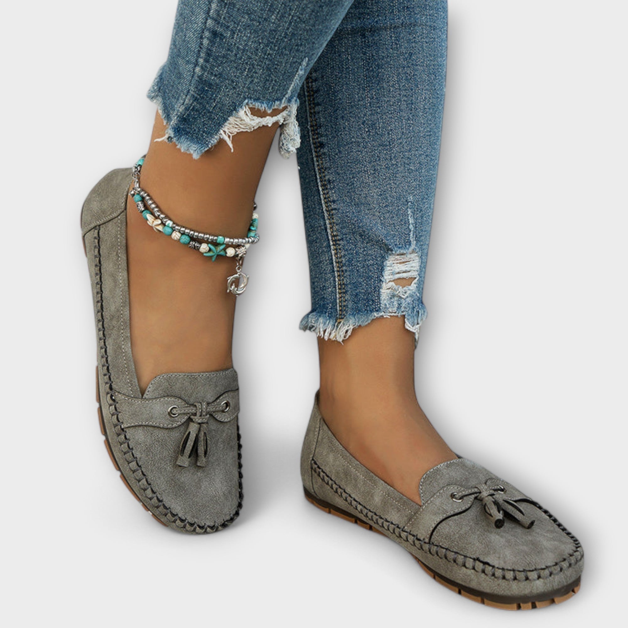 Blue Lisa stylish loafers by THE WHITMORE FAMILY, featuring a sleek design and comfortable slip-on style.