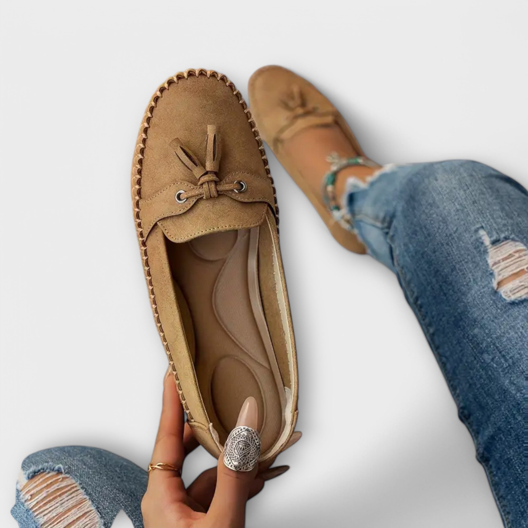 Blue Lisa stylish loafers by THE WHITMORE FAMILY, featuring a sleek design and comfortable slip-on style.