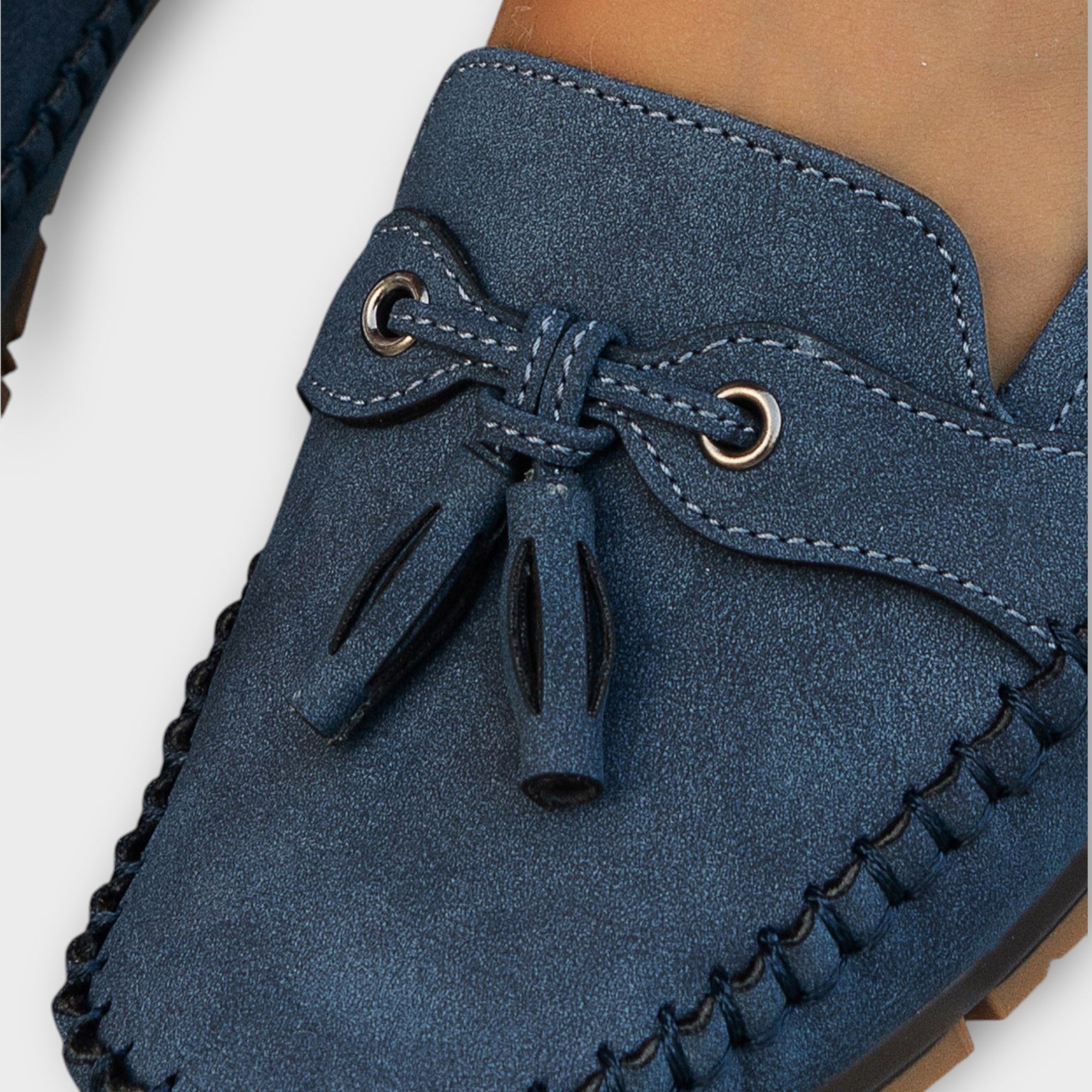 Blue Lisa stylish loafers by THE WHITMORE FAMILY, featuring a sleek design and comfortable slip-on style.