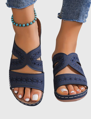 Noëlle™ lightweight orthopedic sandals in blue from THE WHITMORE FAMILY, showing cushioned sole and supportive strap design.