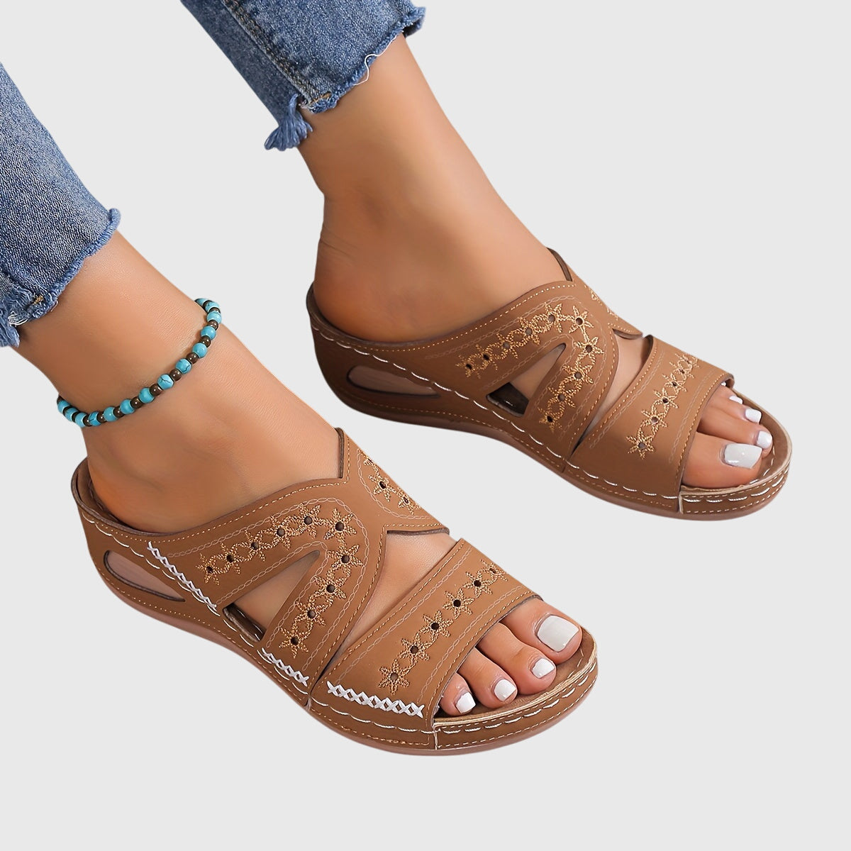 Noëlle™ lightweight orthopedic sandals in blue by THE WHITMORE FAMILY, featuring supportive design and casual style.