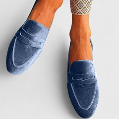 Blue Olivrah comfortable loafers by THE WHITMORE FAMILY, showcasing soft leather uppers and slip-on design.