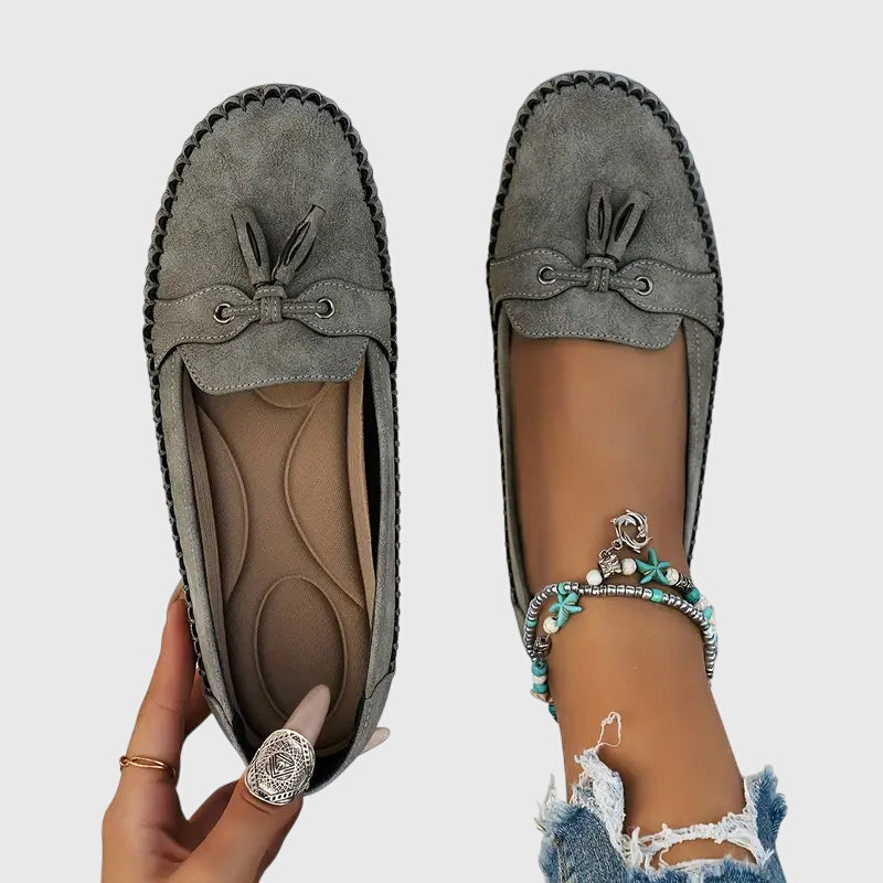 Blue Chelsea loafers from THE WHITMORE FAMILY, showcasing soft, comfortable leather slip-on footwear with a sleek design.
