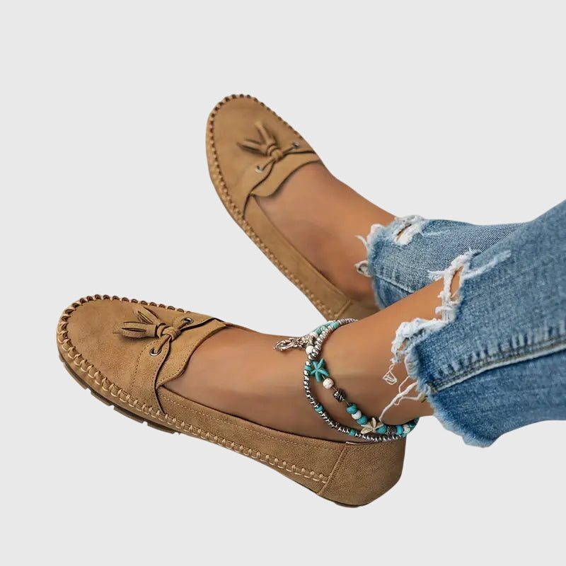 Blue Chelsea loafers from THE WHITMORE FAMILY featuring a comfortable, soft design and classic slip-on style.