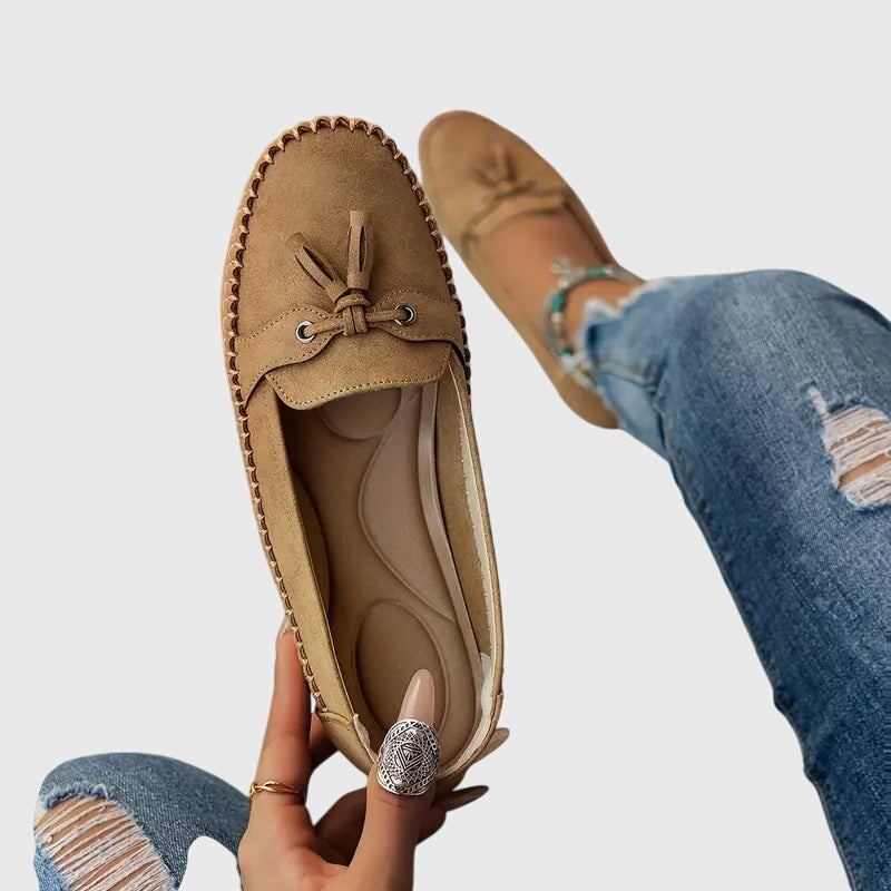 Blue Chelsea comfortable soft loafers by THE WHITMORE FAMILY, showcasing a sleek slip-on design and cushioned sole.