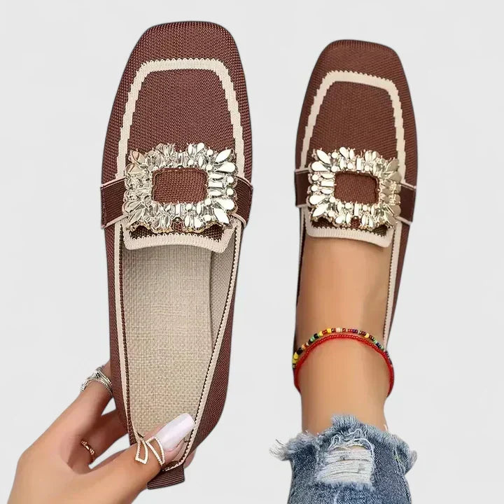 Blue Mary orthopedic loafers by THE WHITMORE FAMILY with a sleek design and comfortable fit, shown from a side angle.