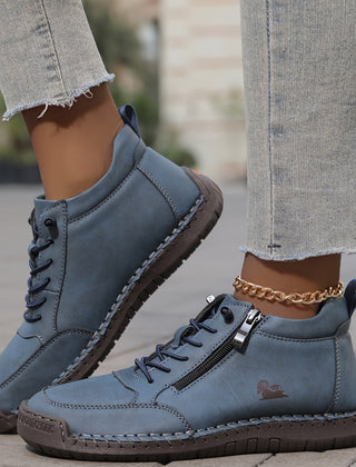 Blue Soline™ ergonomic support sneakers by THE WHITMORE FAMILY with cushioned insoles and supportive design for comfort.