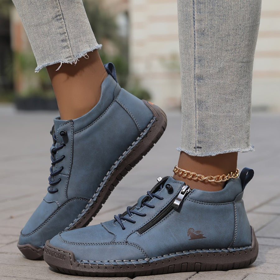 Blue Soline™ ergonomic support sneakers by THE WHITMORE FAMILY with cushioned insoles and supportive design for comfort.