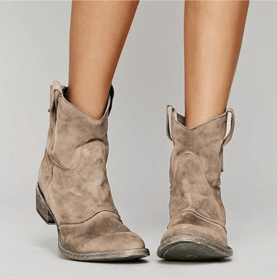 Charlotte suede orthopedic boots by THE WHITMORE FAMILY featuring a stylish design and sturdy sole for comfortable support.