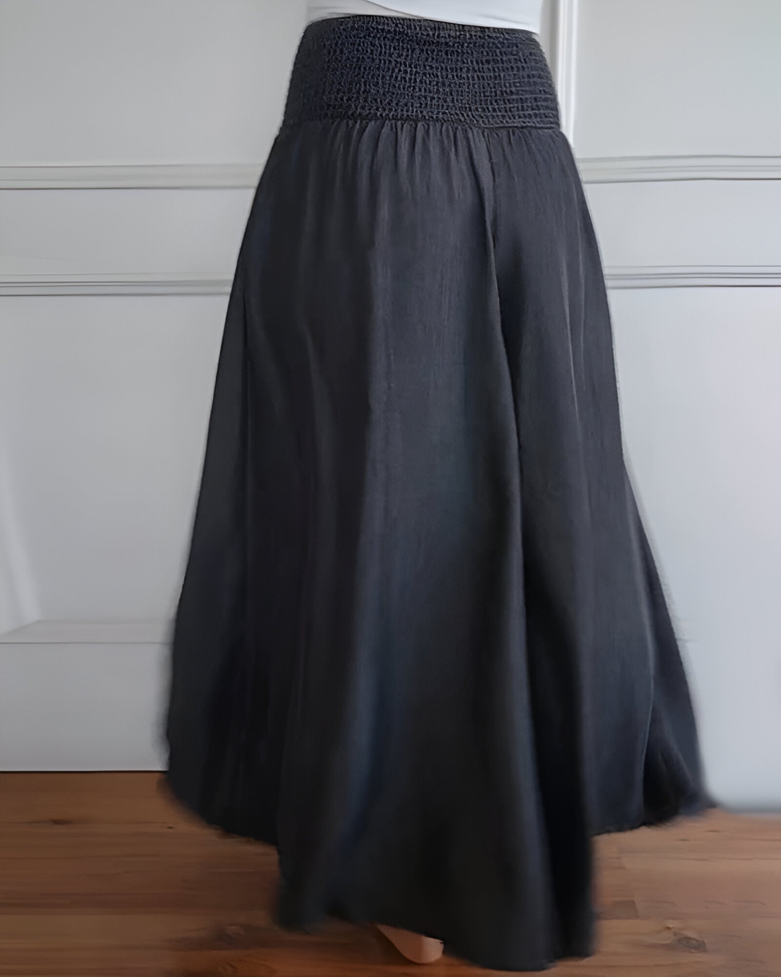 Blue Lorraine™ comfortable pants with elastic waistband from THE WHITMORE FAMILY, featuring a relaxed fit and soft fabric.