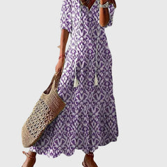 Blue Amalia boho vintage summer maxi dress by THE WHITMORE FAMILY, flowing fabric with intricate patterns and relaxed fit.