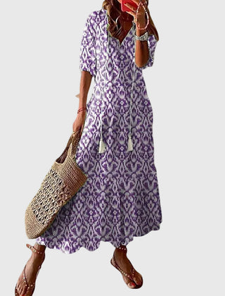 Blue Amalia boho vintage summer maxi dress by THE WHITMORE FAMILY, flowing fabric with intricate patterns and relaxed fit.