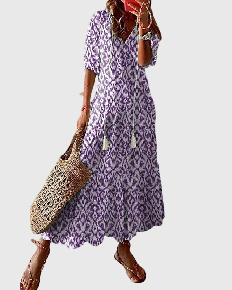 Blue Amalia boho vintage summer maxi dress by THE WHITMORE FAMILY, flowing fabric with intricate patterns and relaxed fit.