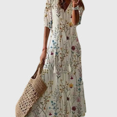 Blue Amalia boho vintage summer maxi dress by THE WHITMORE FAMILY, flowing fabric with intricate patterns and relaxed fit.