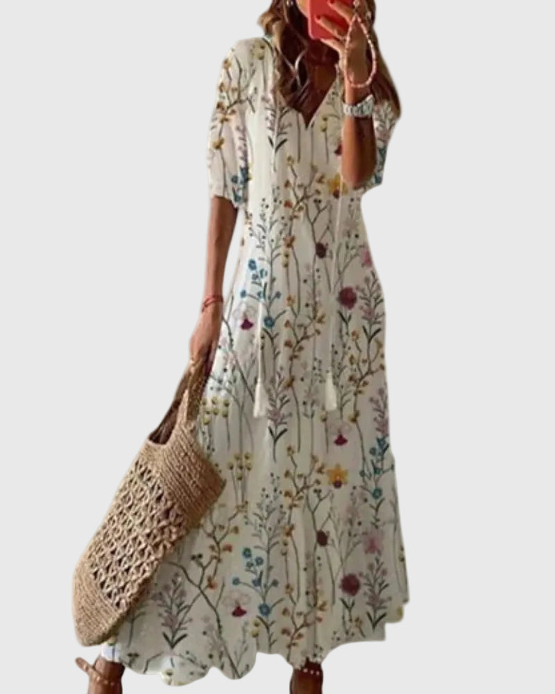Blue Amalia boho vintage summer maxi dress by THE WHITMORE FAMILY, flowing fabric with intricate patterns and relaxed fit.