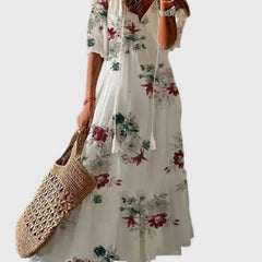 Blue boho vintage maxi dress by THE WHITMORE FAMILY, featuring a flowy summer design with intricate patterns and lightweight fabric.