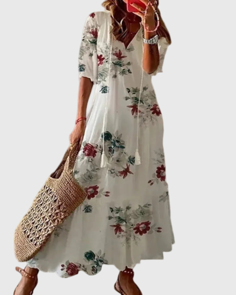 Blue boho vintage maxi dress by THE WHITMORE FAMILY, featuring a flowy summer design with intricate patterns and lightweight fabric.