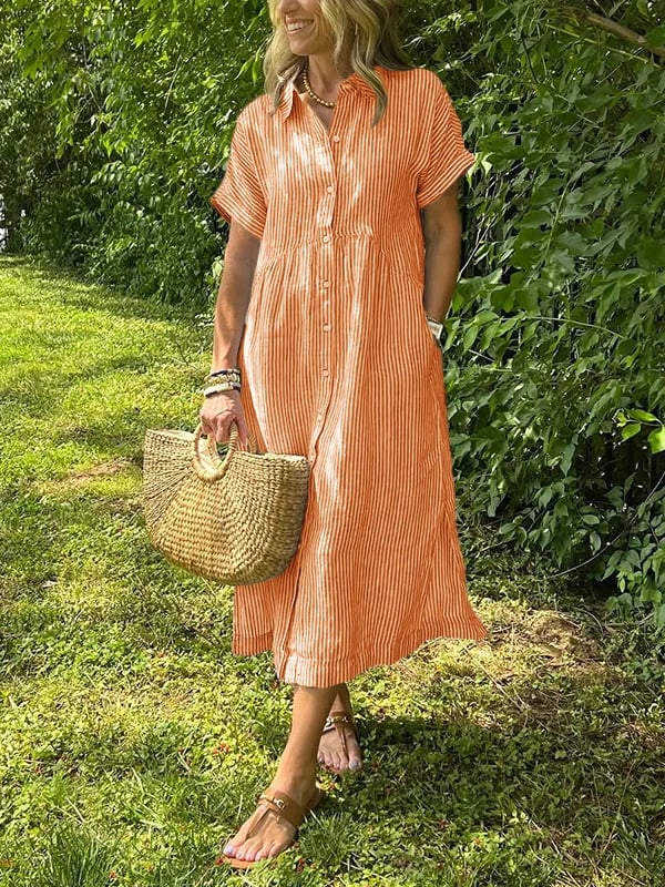 Blue Angela maxi dress by THE WHITMORE FAMILY, flowing fabric, sleeveless design, and elegant style for casual or formal wear.