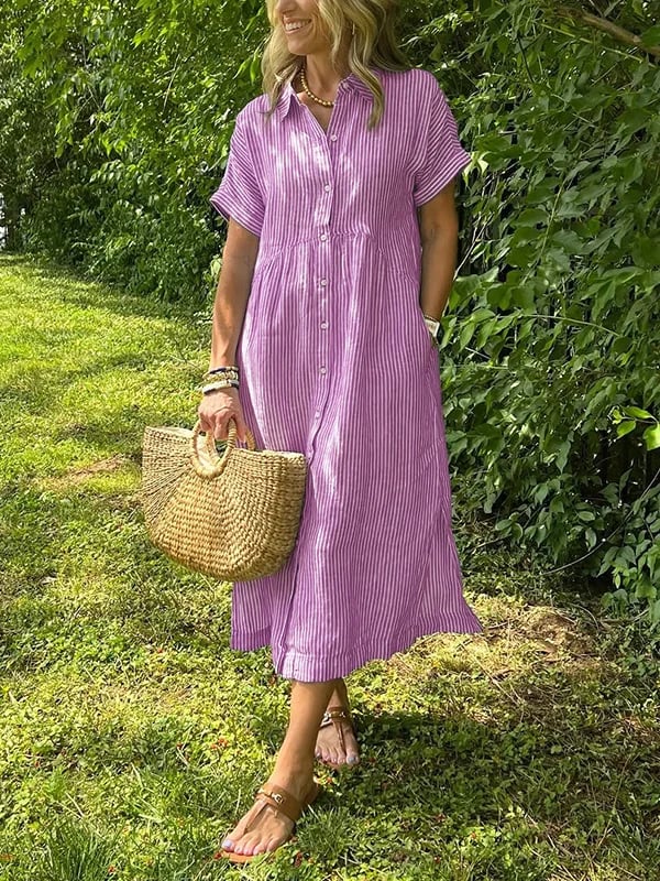 Blue Angela maxi dress by THE WHITMORE FAMILY, flowing fabric, sleeveless design, and elegant style displayed in the image.