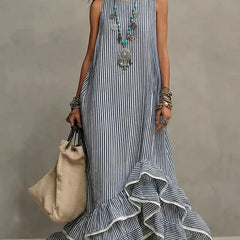 Blue Grace retro ruffled casual maxi dress by THE WHITMORE FAMILY, featuring a flowing silhouette and vintage-inspired design.