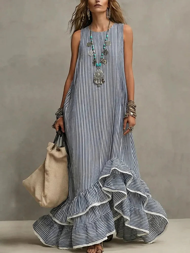 Blue Grace retro ruffled casual maxi dress by THE WHITMORE FAMILY, featuring a flowing silhouette and vintage-inspired design.