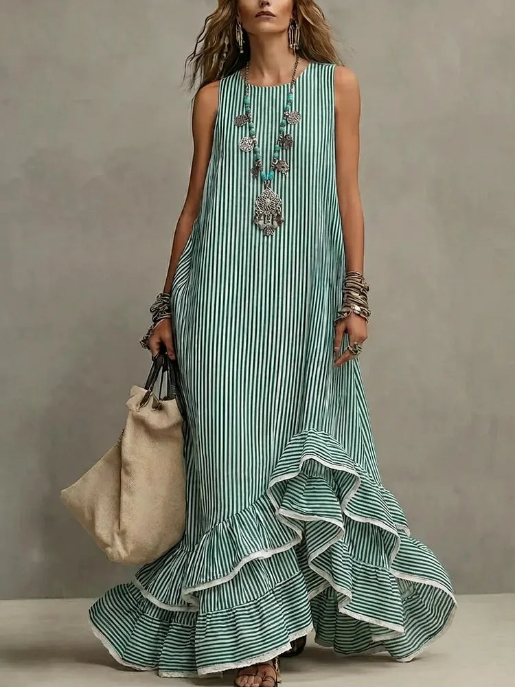 Blue Grace retro ruffled casual maxi dress by THE WHITMORE FAMILY, flowing fabric with ruffle details and a relaxed fit.
