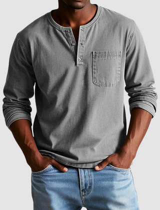 Blue Harrison™ Vintage Henley Shirt from THE WHITMORE FAMILY with a classic collar and buttoned placket, casual and comfortable style.