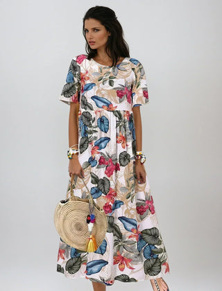 Blue Lovi Graceful Summer Bloom floral dress by THE WHITMORE FAMILY featuring a flowy design and vibrant summer-inspired pattern.