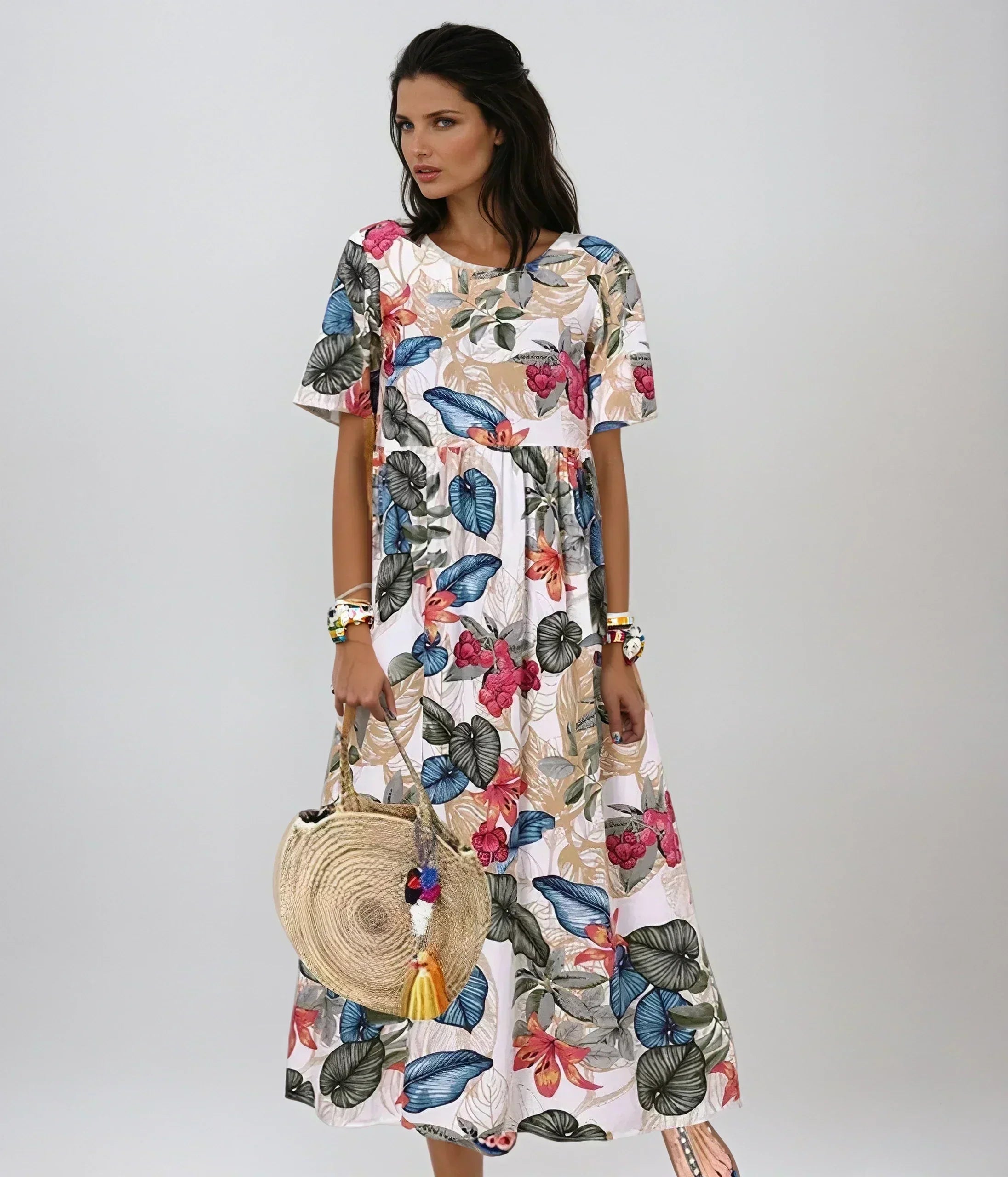 Blue Lovi Graceful Summer Bloom floral dress by THE WHITMORE FAMILY featuring a flowy design and vibrant summer-inspired pattern.
