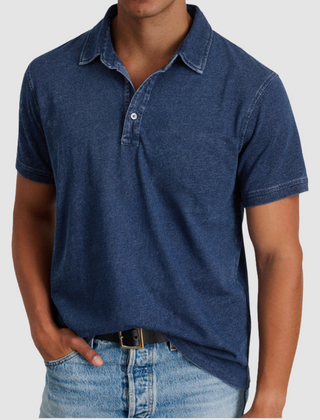 Blue Luther™ Classic Collared Polo shirt by THE WHITMORE FAMILY, displayed on a model with a structured collar and short sleeves.