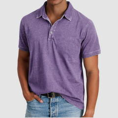 Blue Luther™ Classic Collared Polo by THE WHITMORE FAMILY, shown on a model with a button-up collar and short sleeves.