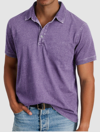 Blue Luther™ Classic Collared Polo by THE WHITMORE FAMILY, shown on a model with a button-up collar and short sleeves.